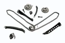 MONTTRON timing chain kit: a timing chain with its crankshaft and camshaft sprockets, the hydraulic tensioner and the plastic-faced guide rails laid out together